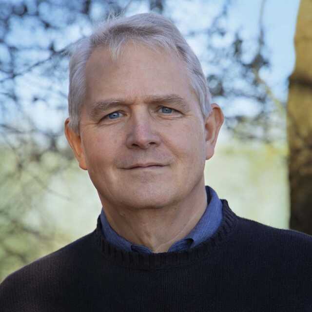 Portrait of Timothy Young in a dark sweater.